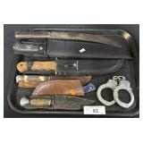 Bowie Knives & Handcuffs.