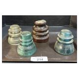 4 Glass Insulators.