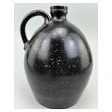 Glazed Redware Pottery Strap Handled Jug.