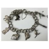 Sterling Silver Charm Bracelet w/ 8 Charms.