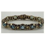 Vintage 14KT Gold Blue Topaz Tennis Bracelet.