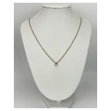 10KT Gold Diamond Pendant on 14K Chain.