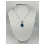 18KT Gold Blue Topaz Diamond Pendant Necklace.