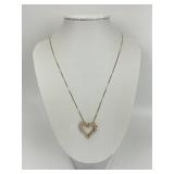 14KT Gold Cubic Zirconia Heart Pendant Necklace.
