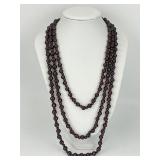14KT Gold Clasped Beaded Garnet Necklace.