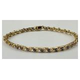 14KT Gold Sapphire S Link Bracelet.