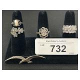4 Sterling Silver Rings & Bird Brooch.