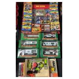 6 NOS Hess Trucks, 17 Super Fast Cars.