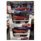 3 NOS Maisto Model Cars.