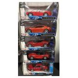 5 NOS Maisto Die Cast Cars.