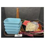 Ceramic Loaf Pans, Buttons, Fabric.
