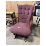 Clean Upholstered Wooden Glider.