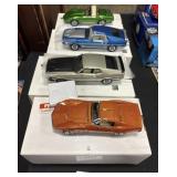 4 NOS Die Cast Cars.
