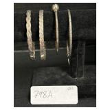 4 Sterling Silver Bangle Bracelets.