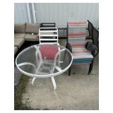 Glass Top Round Patio Table, Mesh Chairs.