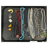 Costume Jewelry, Necklaces, Brooches, Earrings.