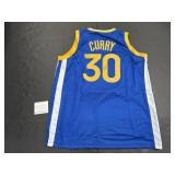 Autographed Steph Curry Jersey.