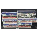 6 Various Hess Trucks, Rescue Truck, Helicopter.