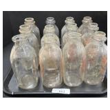 12 Vintage Milk Bottles.