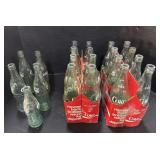 Coc- Cola Bottles & Carriers.