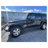 2009 Jeep Wrangler, 145,031 Miles.