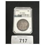 Graded 90% Silver Morgan Dollar.
