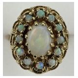 10KT Gold Oval Opal Halo Ring.