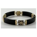 14KT Gold Asian Theme Onyx Link Bracelet.