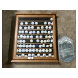Display Case w/ Golf Balls.