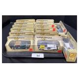 14 NOS Models Of Yesteryear Trucks.