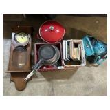 Wall Clock, Cuisinart Pot, Bowling Ball, Books.