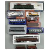 Locomotive Engine, Passenger Cars, Reefers, Crane.