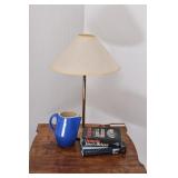Blue Pitcher, Brass Lamps, Set of Books