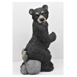 Bear Sitting on Gnome Statue