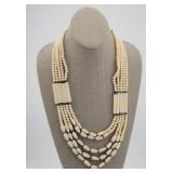 Carved Bone Bead Four Strand Necklace