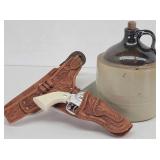 Western-Style Gun & Holster + Stoneware Jug