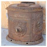 Rustic Cast Iron Stove Belly Artistic Detail