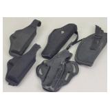 (5) Assorted Black Firearm Holsters