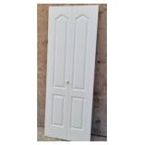 Interior Bi-Fold Door Double Paneled Arch Top