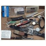 Flat of: Nail Clippers, Watches, Pocket Knives...