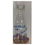 S.A Balls vintage milk bottle