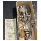 Vintage cherry pitter and box