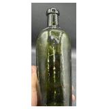 Antique green glass bottle