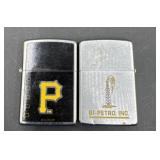 Two advertising zippo lighters