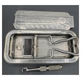 Antique roll razor and metal case