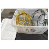 Extension cords and plastic tub