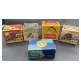 Empty fishing reel advertisement boxes