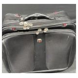 Luggage carrier on wheels