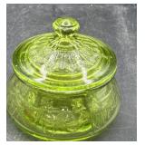 Miniature green glass trinket jar