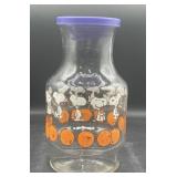 Vintage glass snoopy orange juice container